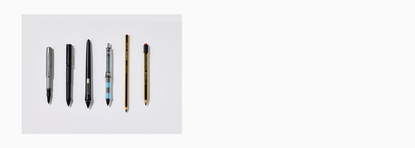 Variety of stylus pens on white background.