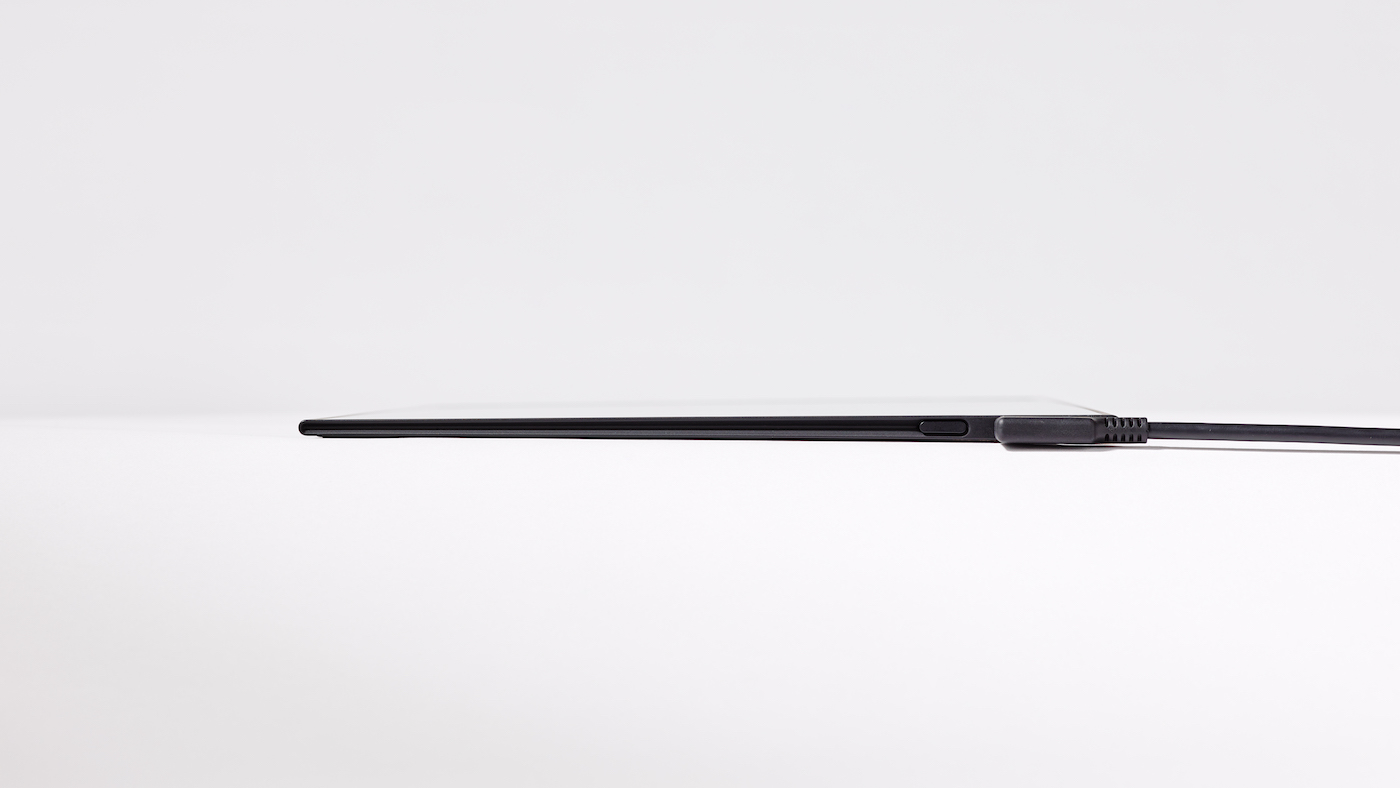 Thin and sleek side view of Wacom Movink with power cable attached
